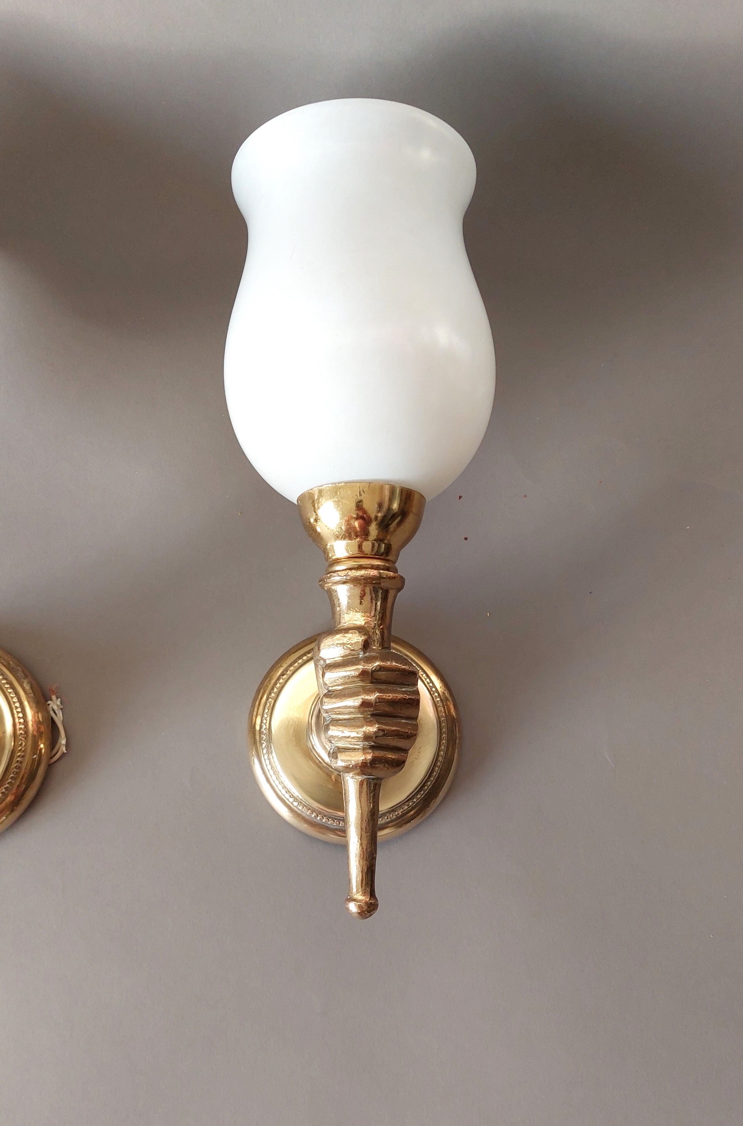 Pair of bronze and gilded brass sconces by John Devoluy 1950.