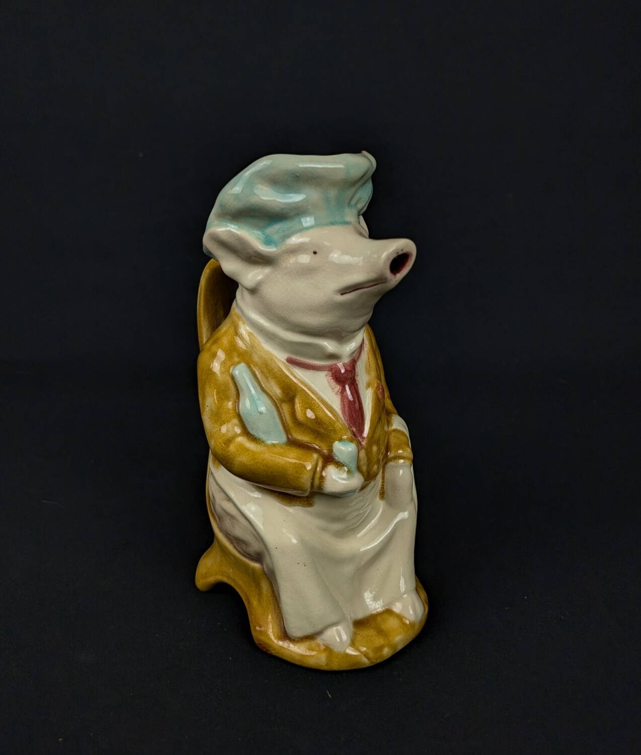 Zoomorphic pitcher pig hotelier waiter