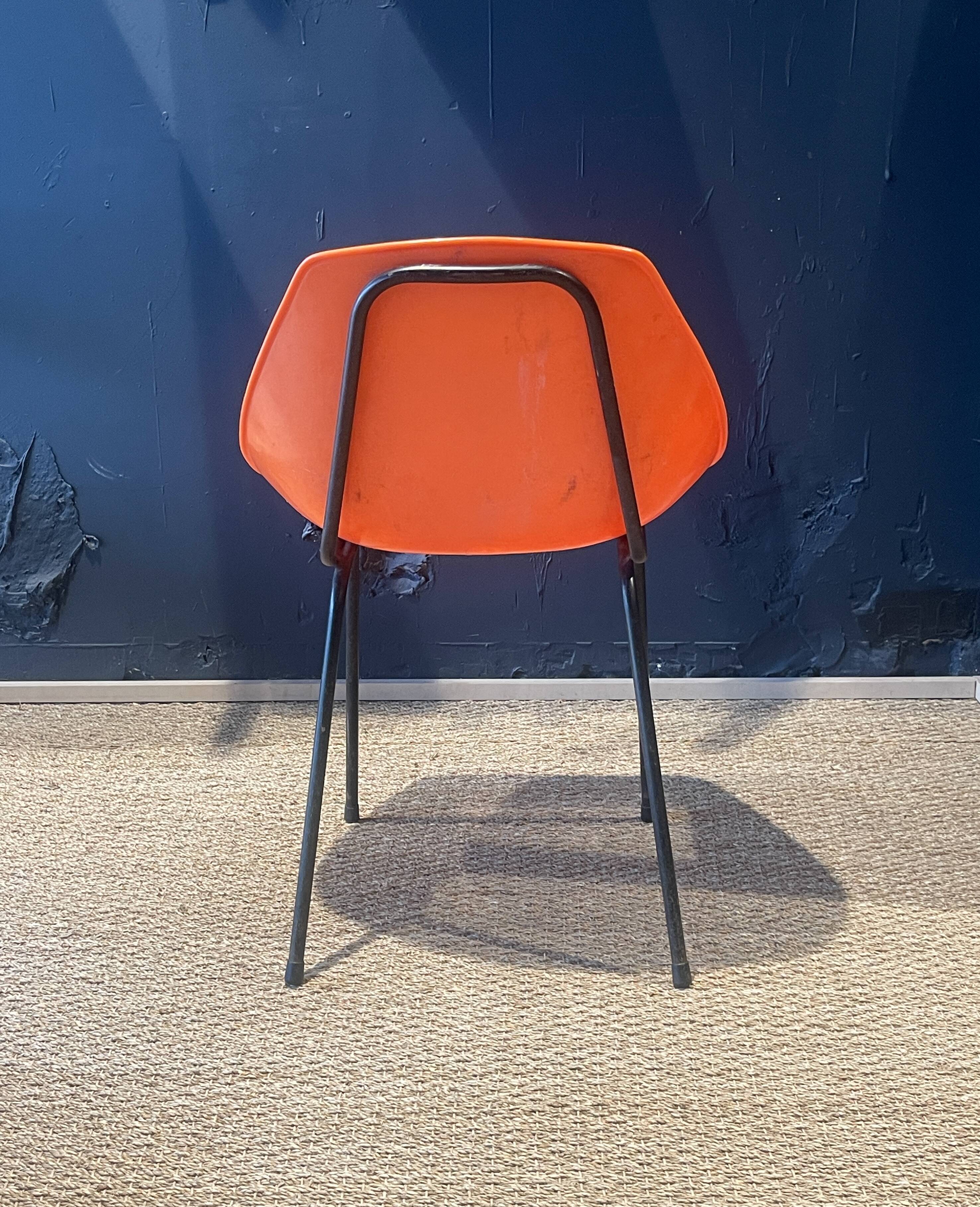 Set of 8 orange Guariche chairs