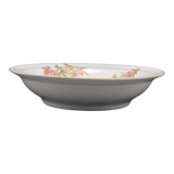 Round hollow Limoges dish with small yellow and purple flower patterns