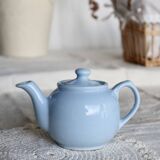 Small vintage sky-blue earthenware teapot