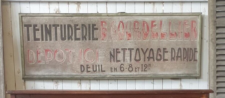 former big wooden advertising sign