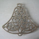 Underside in the shape of an aluminum bell signed WM. A.Rogers kitchen decoration
