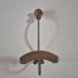 Vintage 1960s wall coat rack in wood and metal.