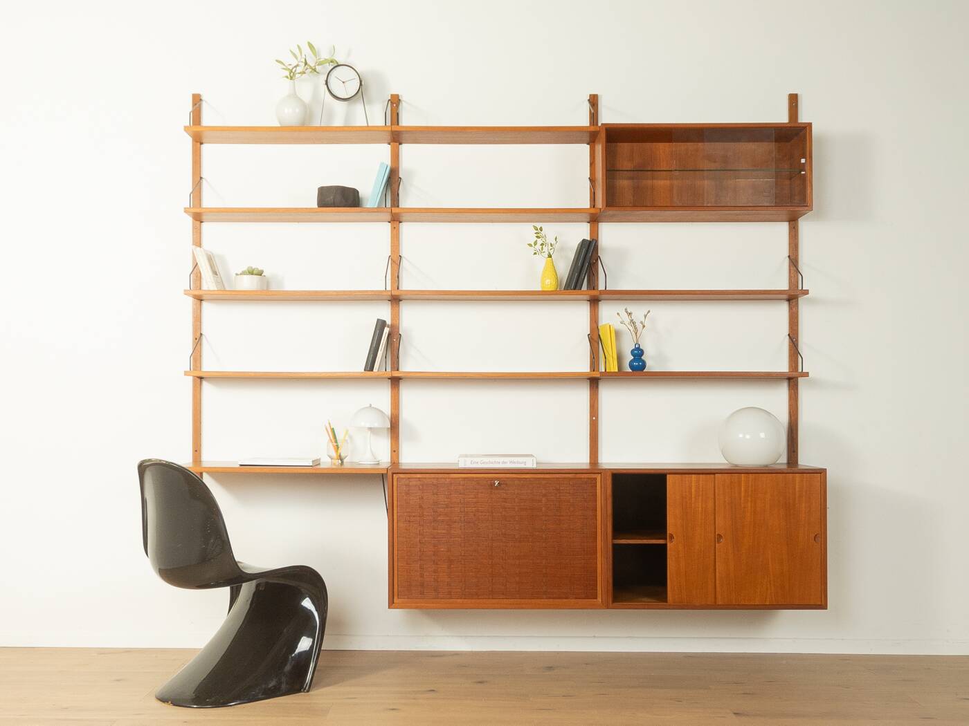 Classic shelving system from the 1950s in teak veneer by Poul Cadovius for Cado