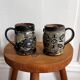 Vintage terracotta mugs with glazed designs and flower/fish motifs