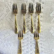 Fourchettes à dessert en métal doré 