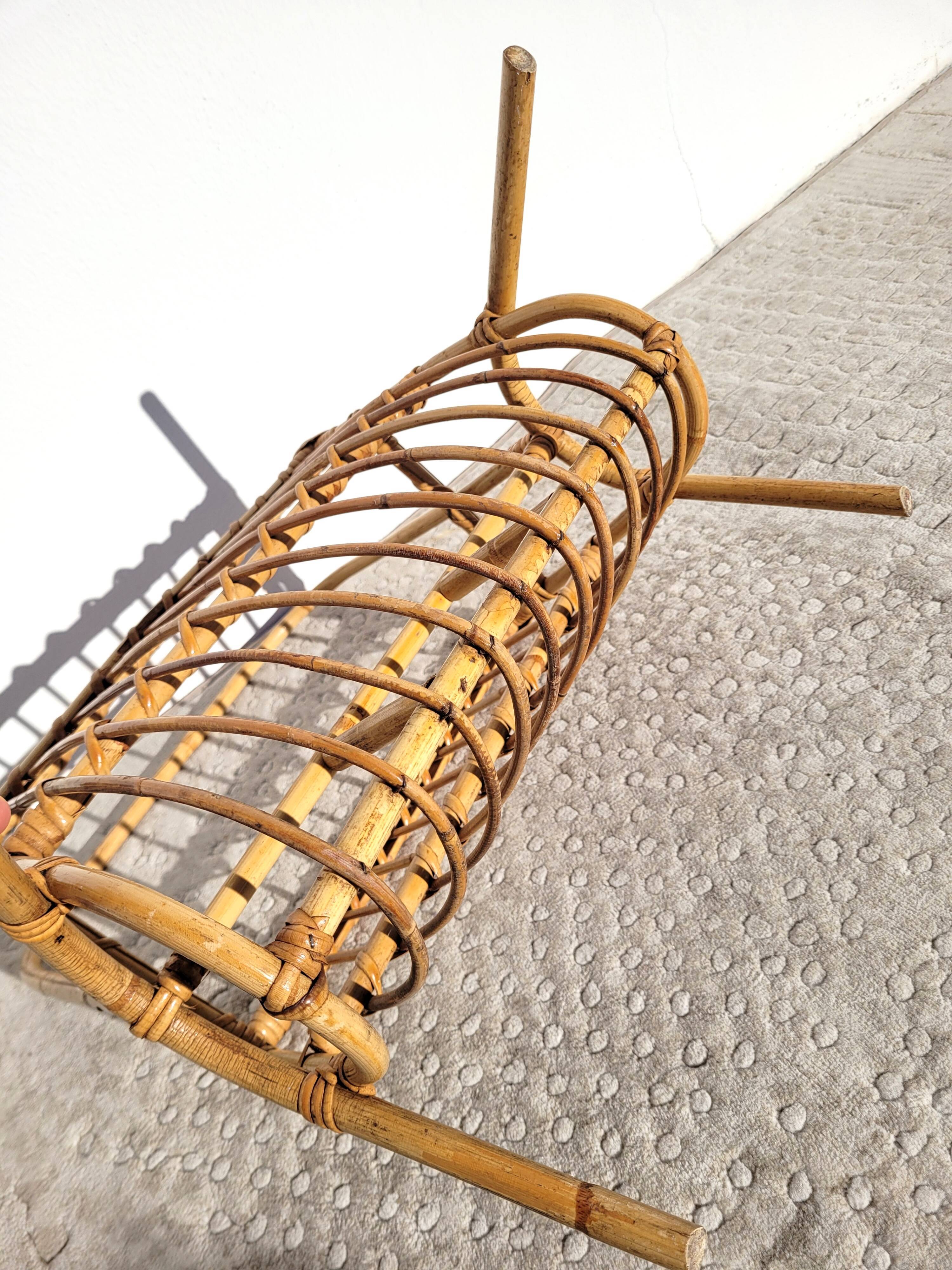 Curved rattan magazine holder 1960