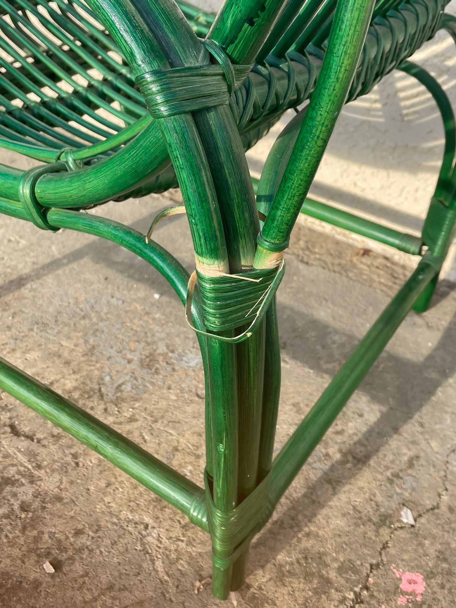 Green rattan armchair