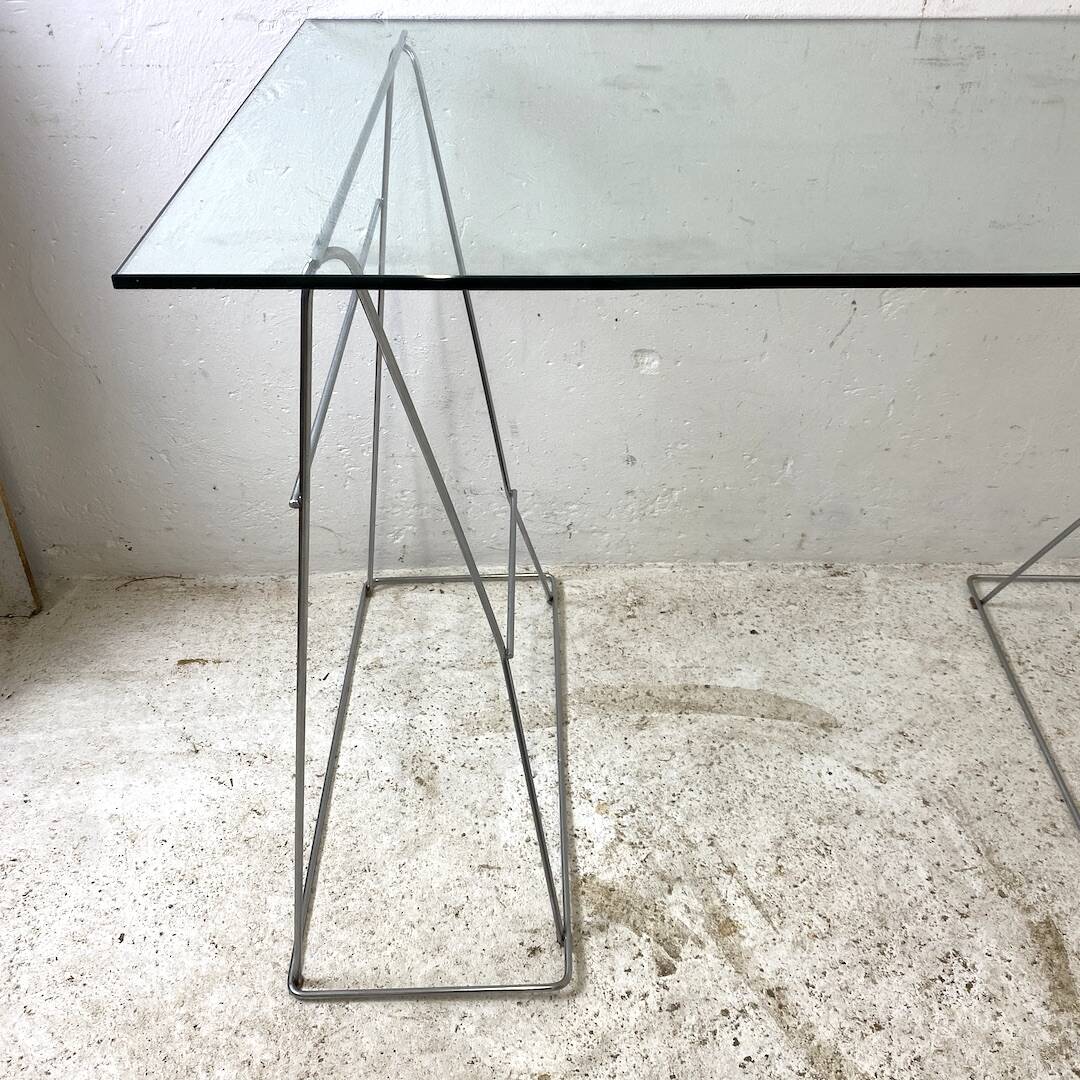 Minimalist glass and metal desk from the 1970s