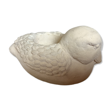 Bird candle holder for indoor or outdoor use.