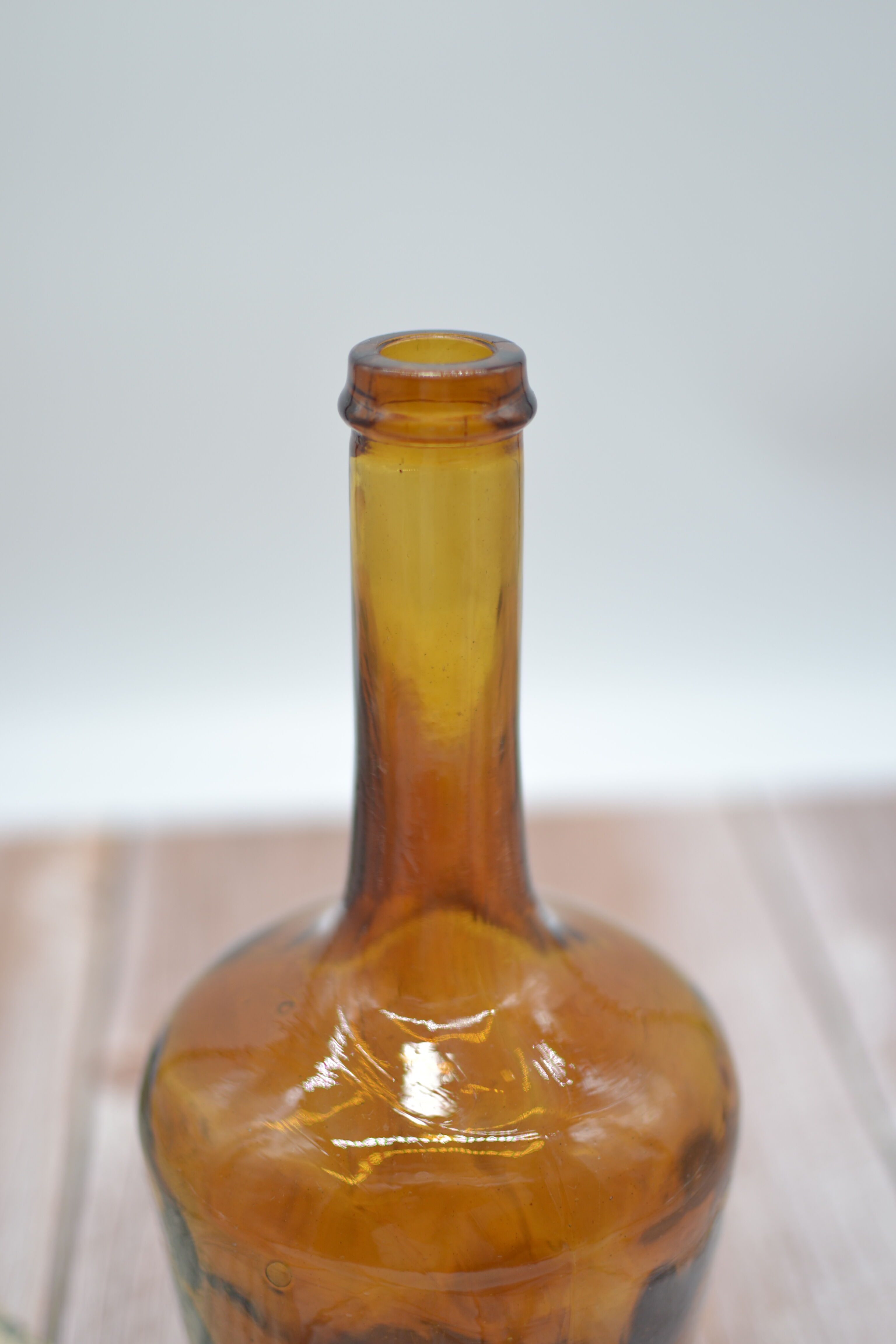 Lady jeanne in amber glass irregular appearance