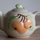 Slush teapot with embossed fruit decoration
