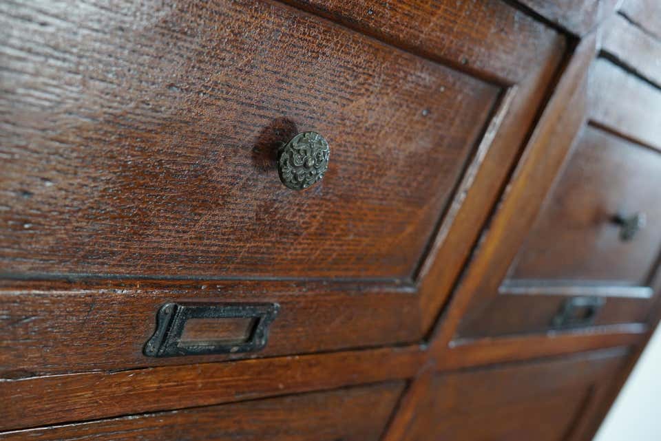 1870s oak apothecary cabinet