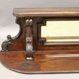 Display shelf with beveled mirror