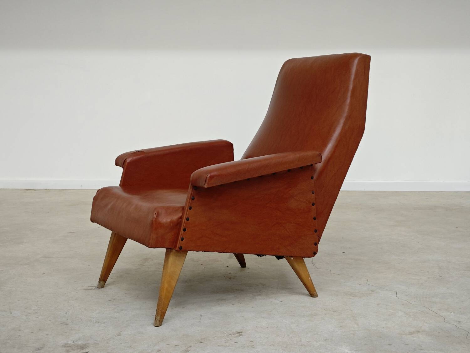 Camel brown imitation leather armchair, France 1960