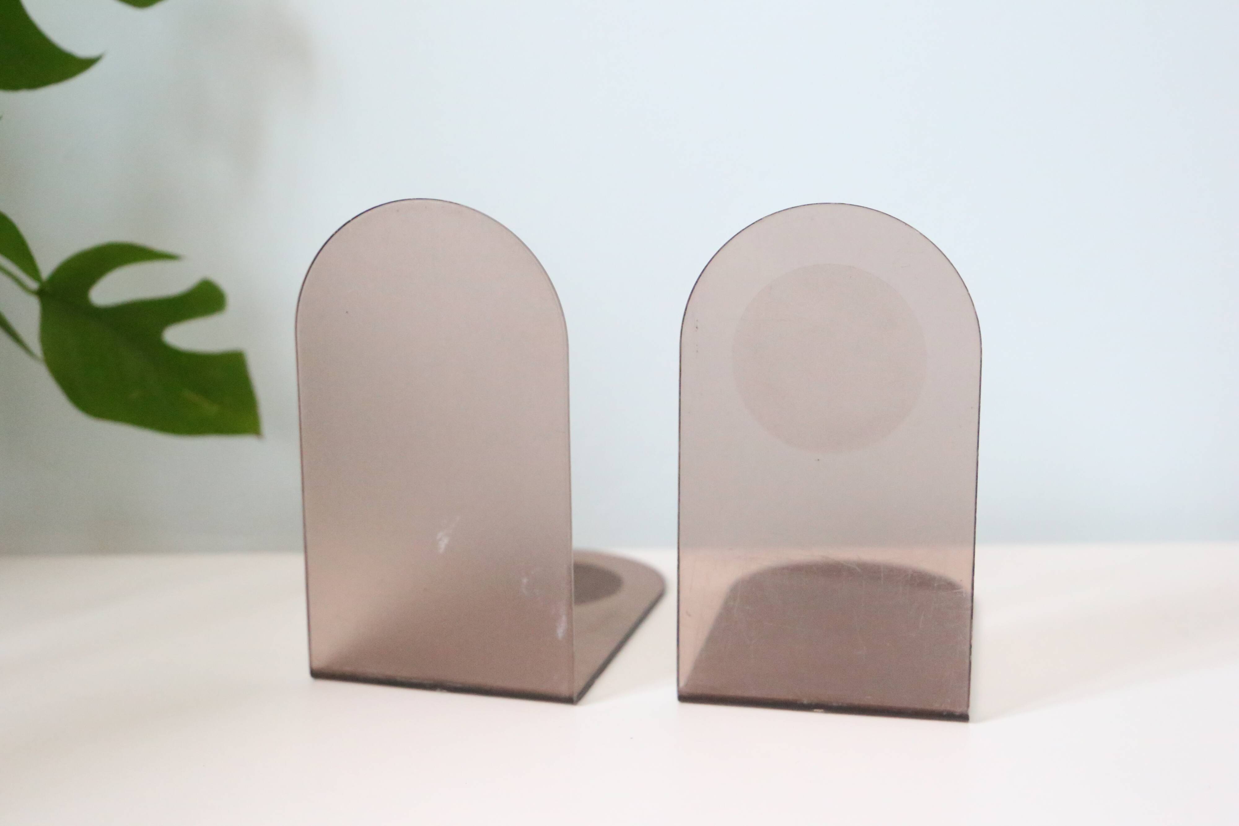 Pair of smoked plexiglass bookends, 1970s
