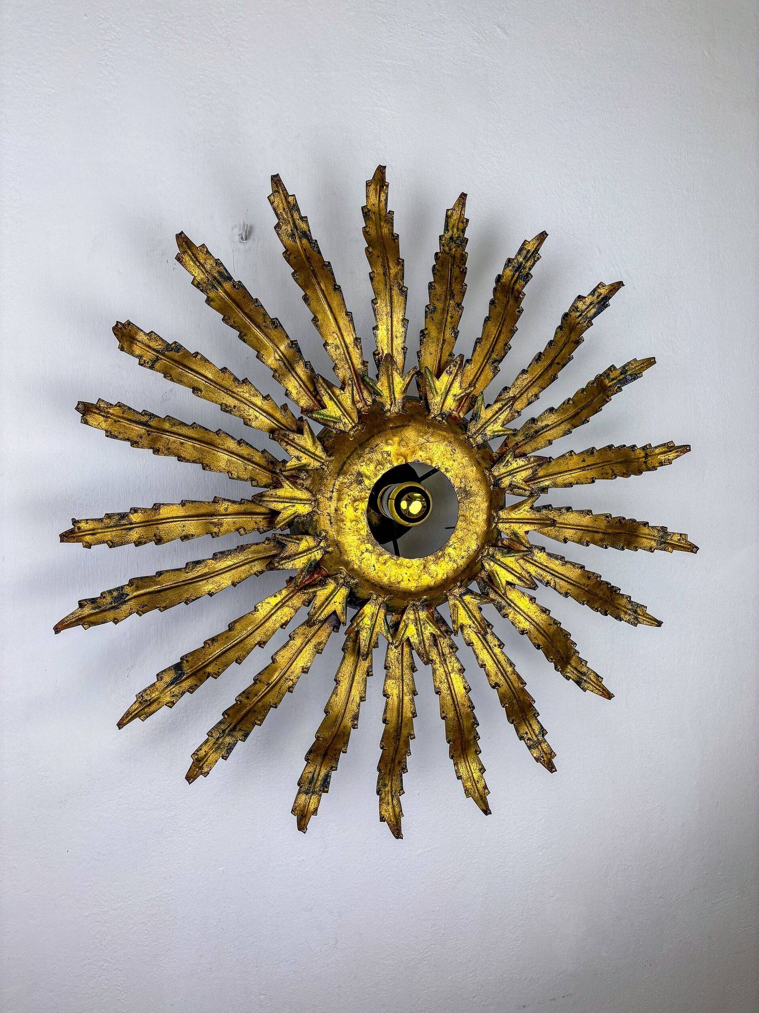Large French sunburst flower leafed light fixture in gilt metal, 1960s