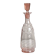Antique translucent pink glass bottle