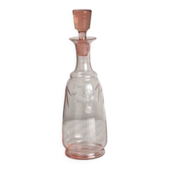 Antique translucent pink glass bottle