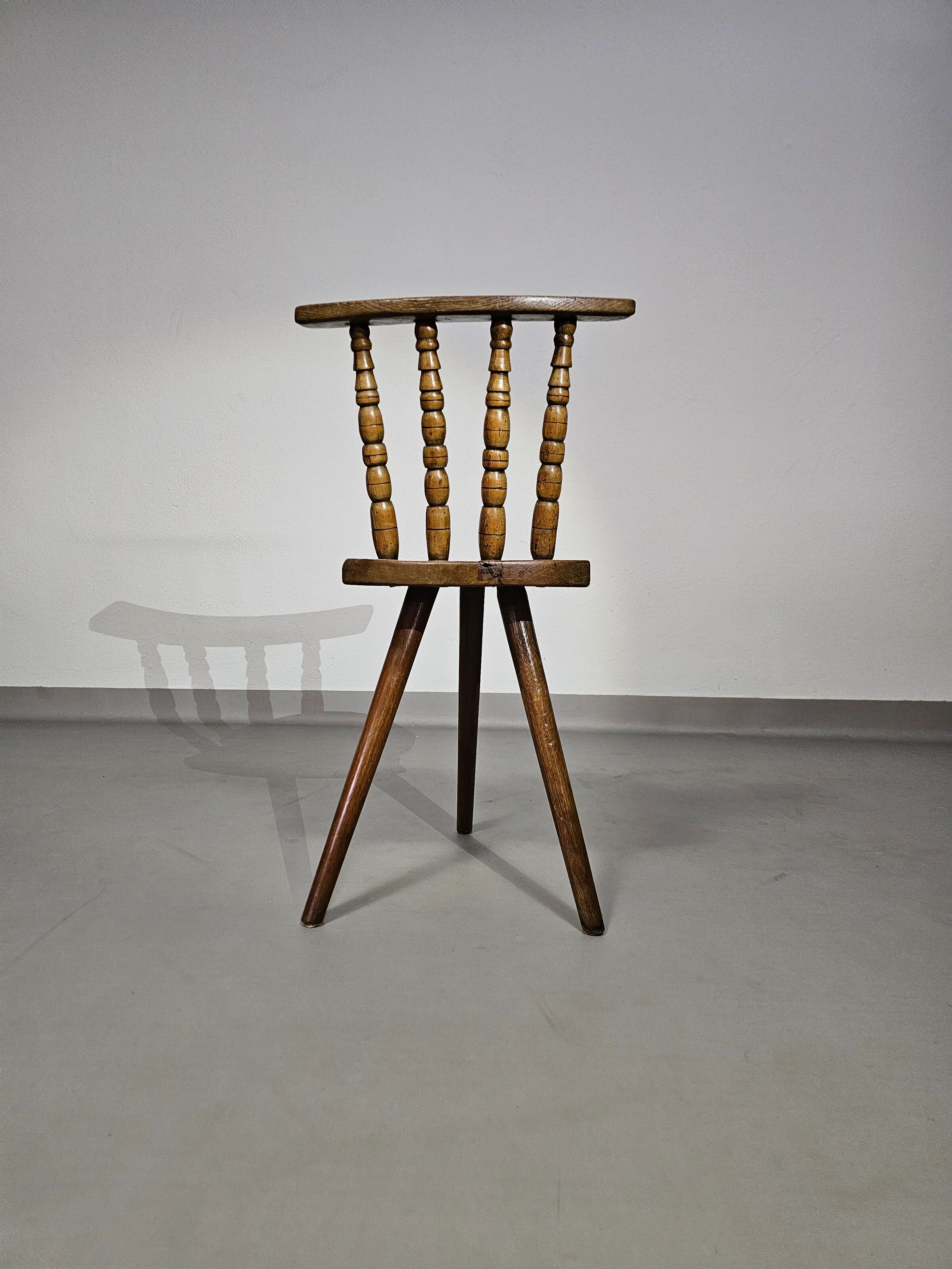 Old farmers tripod chair for decorative use