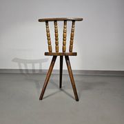 Old farmers tripod chair for decorative use