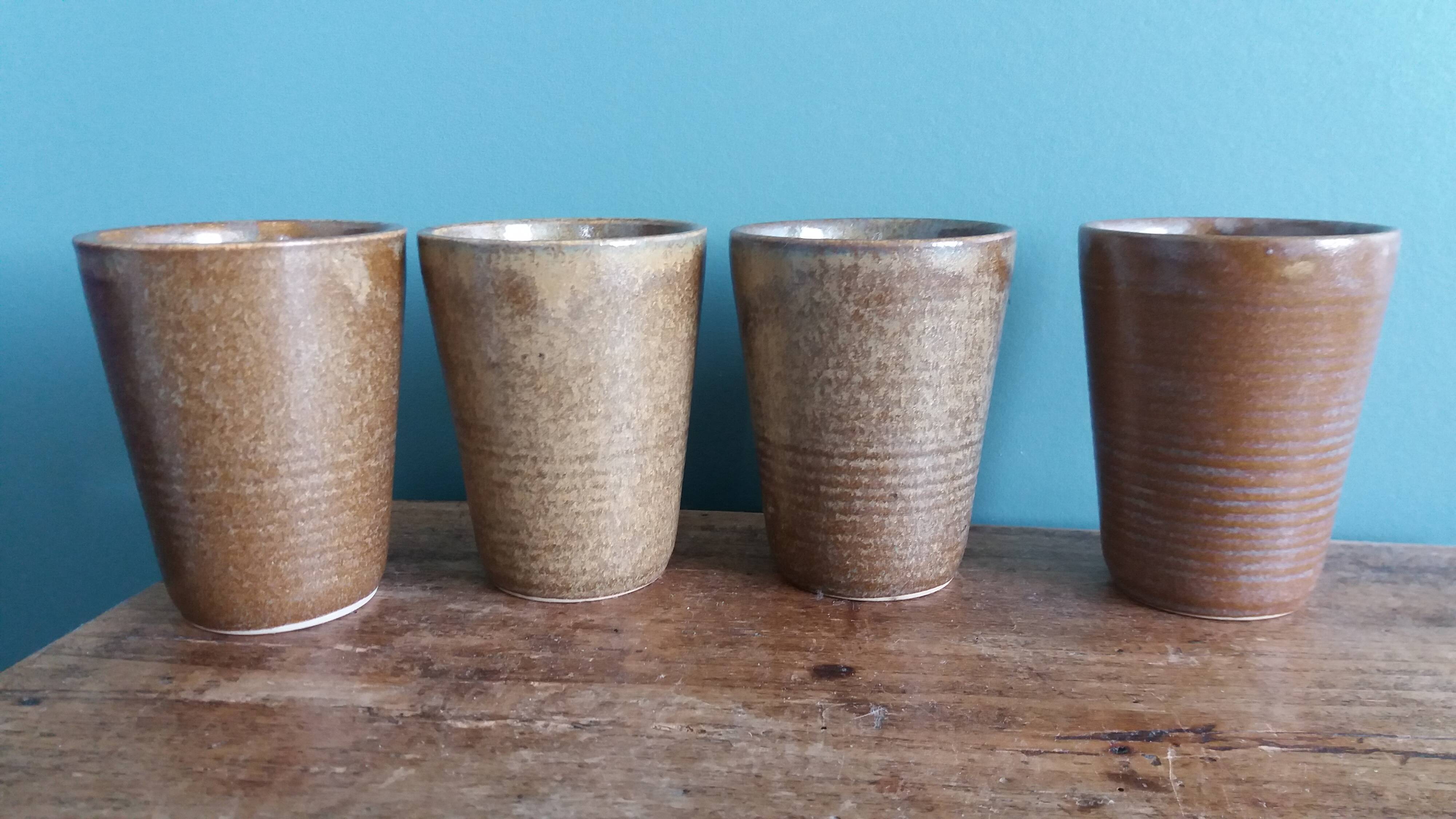 Digoin stoneware mugs, glasses, and cups.