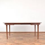Table à manger extensible en teck danois du milieu du siècle, années 1960.