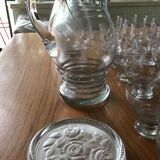 Glassware set with carafes, pitcher and bottle coasters