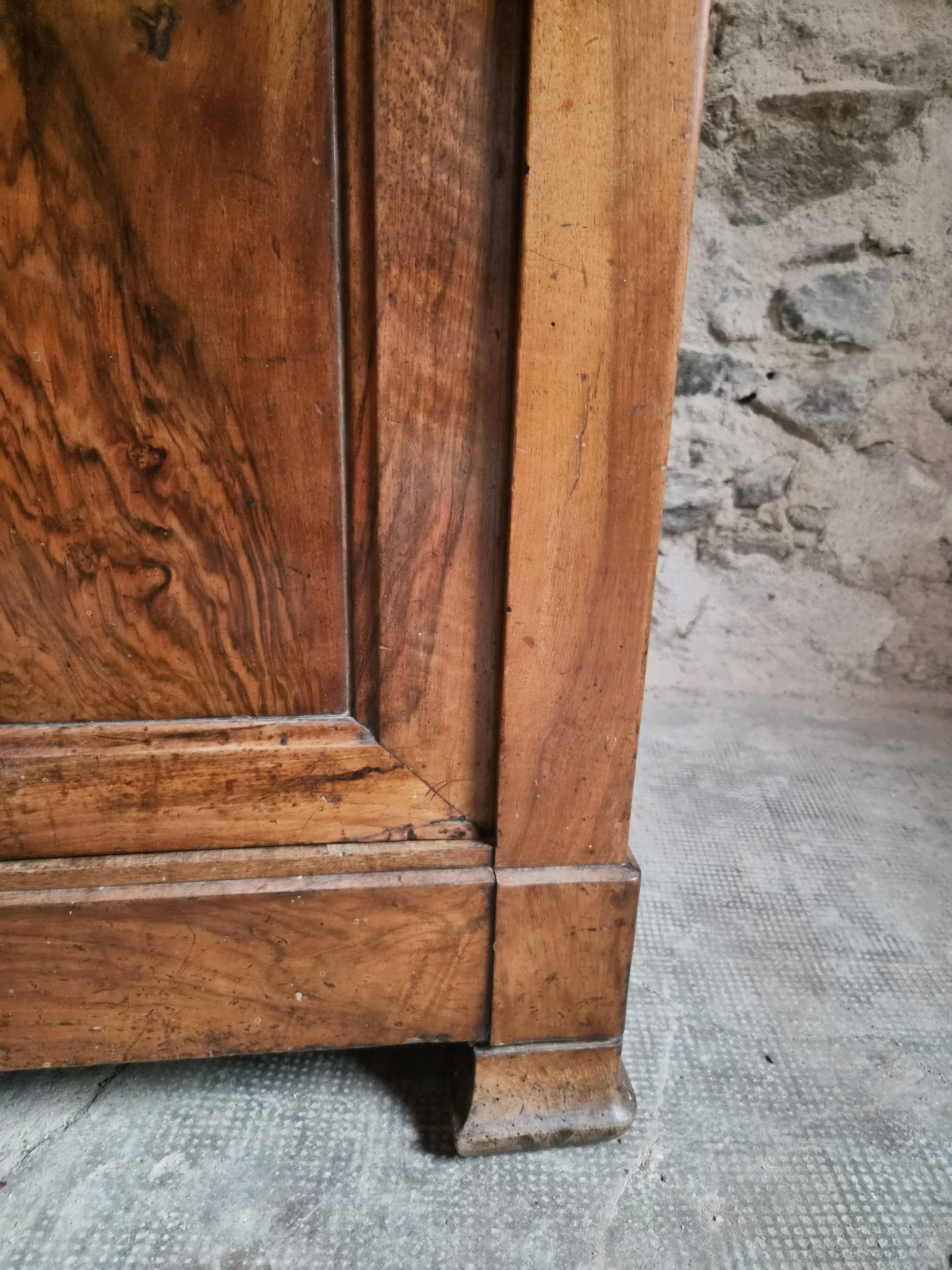 French Louis Philippe walnut buffet with black marble top, France, circa 1840–1860.