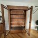 American walnut glass cabinet/bookcase