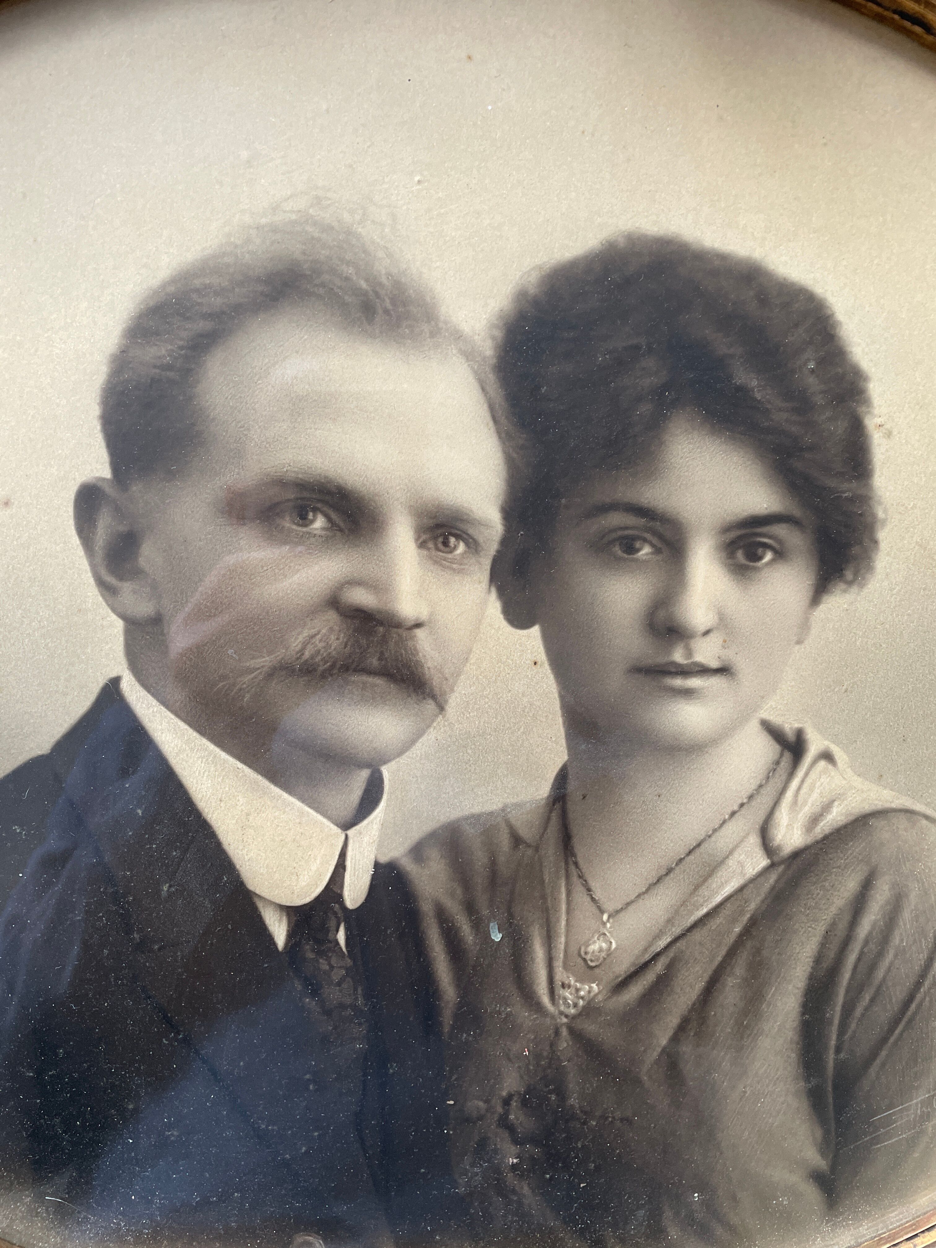 Oval frame portrait of a 19th century couple