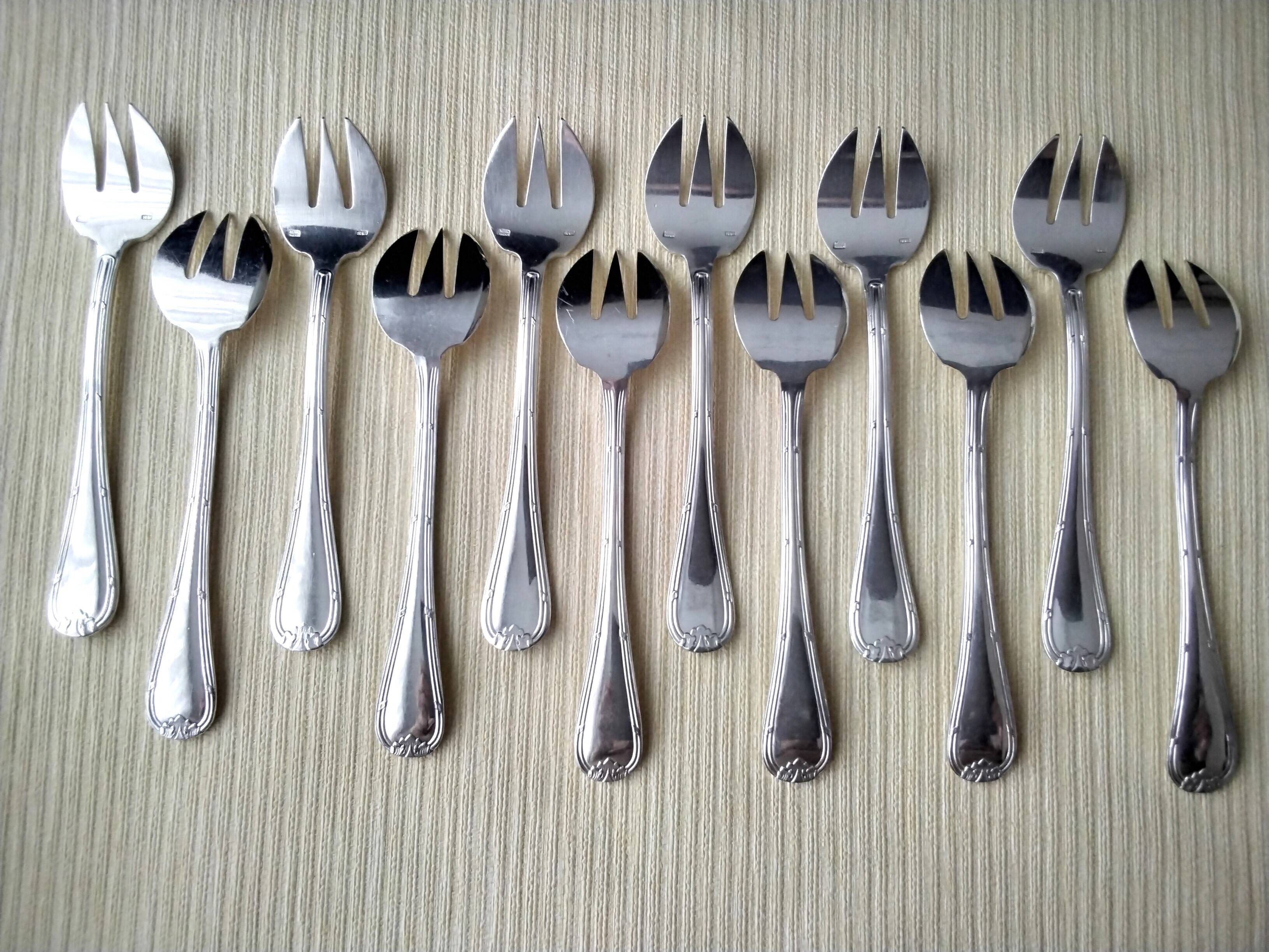 Set of 12 silver-plated oyster forks "Crossed Ribbons"