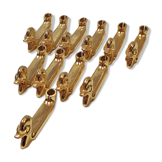 Golden metal knife holders ducks