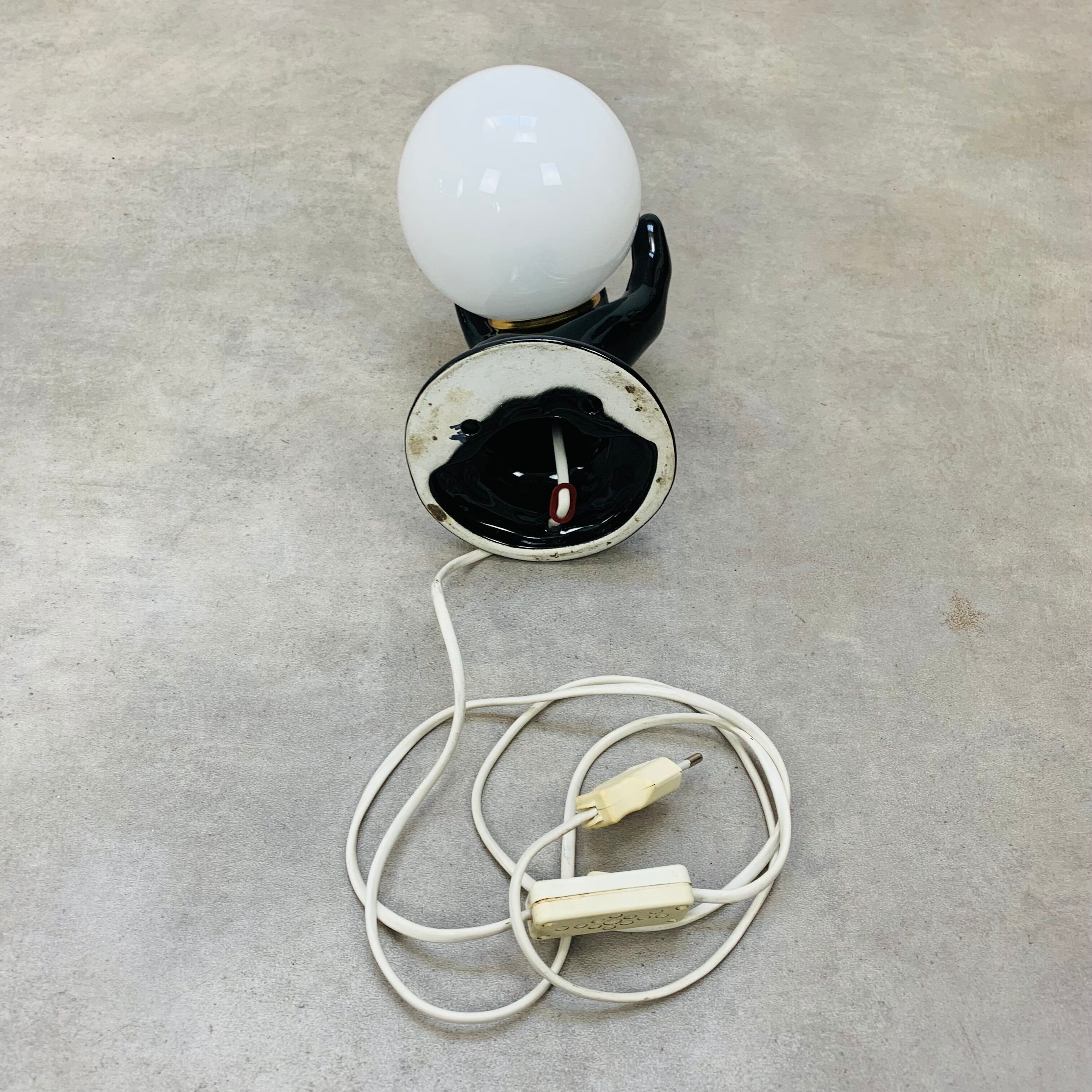 Black and opaline ceramic hand lamp