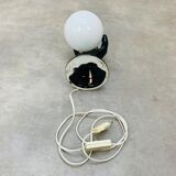 Black and opaline ceramic hand lamp