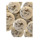 13 decorative plates with hummingbird design in fine earthenware by Mouzin Lecat, 19th century.