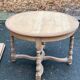 Extendable round farmhouse dining table restored in solid oak from the 19th century