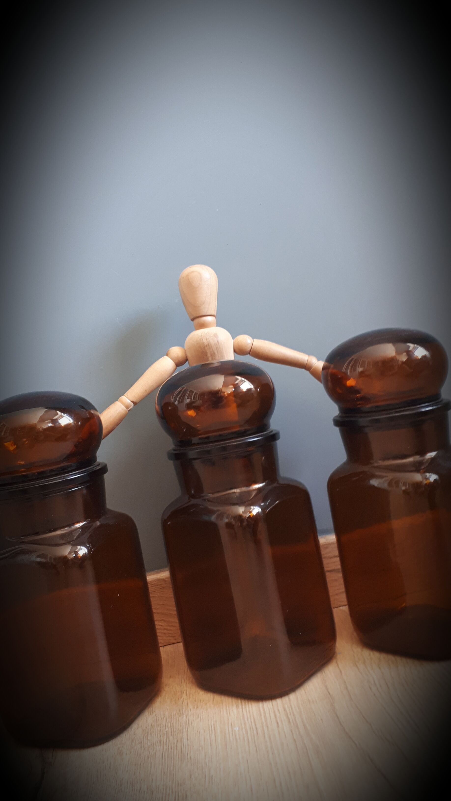 Trio round brown apothecary bottles