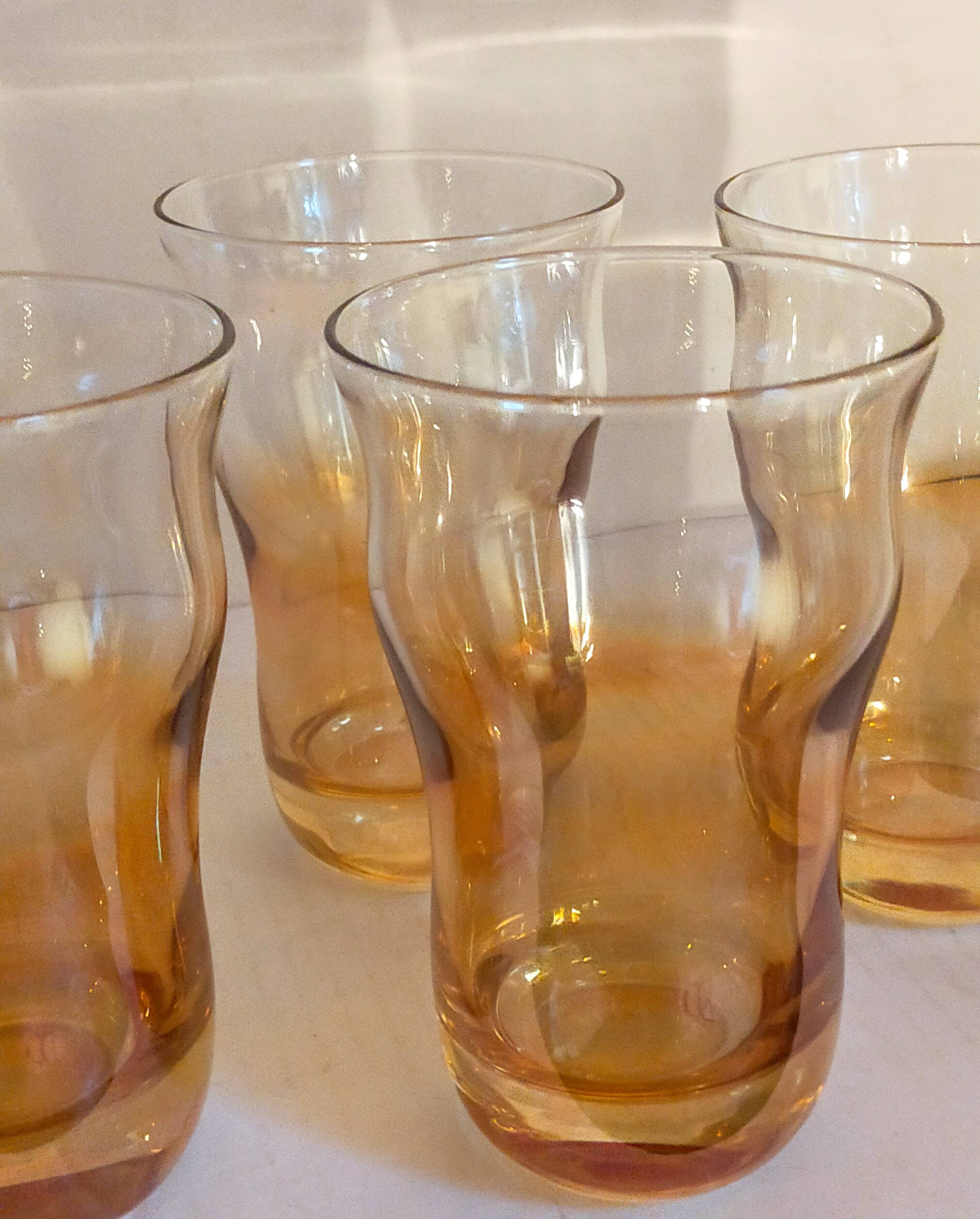 Four iridescent honey blown glass glasses