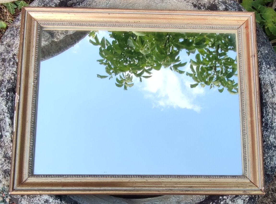 Old little gilded mirror