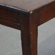 Antique French fruitwood dining table with 2 drawers and patina