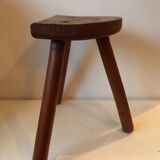 Old wooden tripod stool