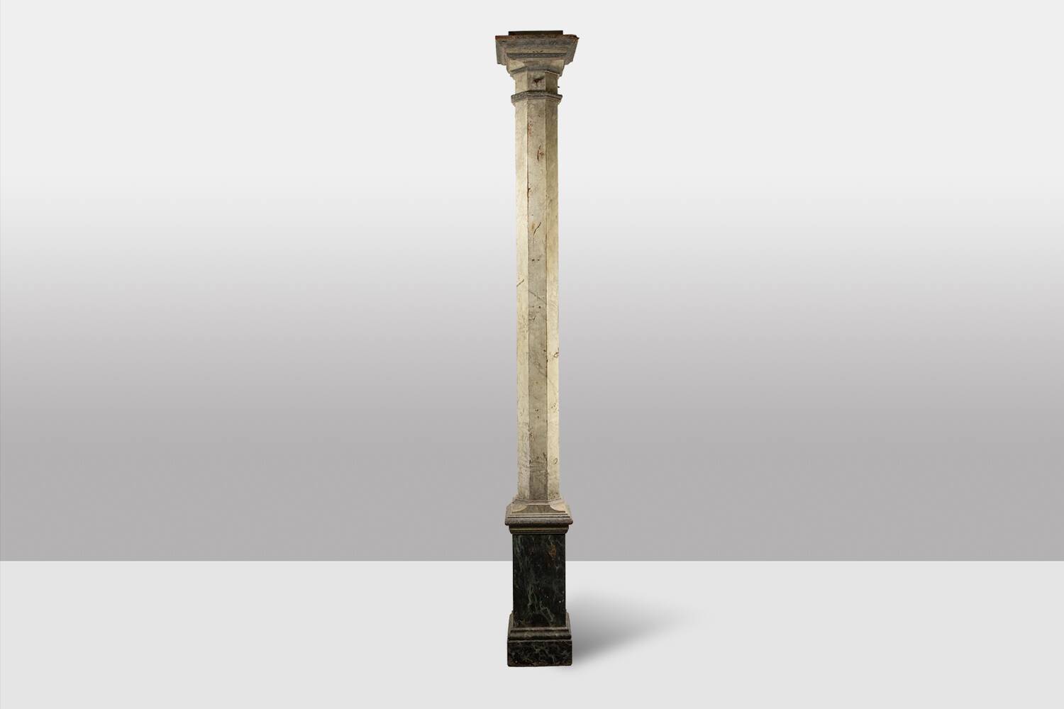 Pair of wooden columns painted to imitate marble. 1880s.