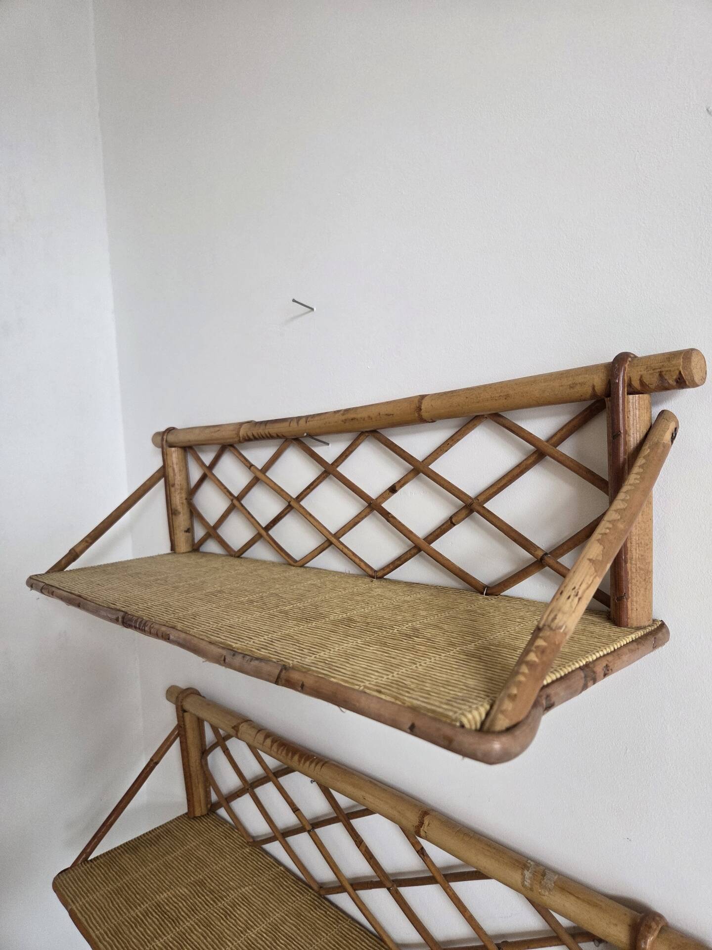 Pair of rattan shelves, 1950s/60s