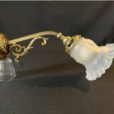 20th century Louis XVI style swan neck wall light in arabesque bronze and pleated glass tulip.