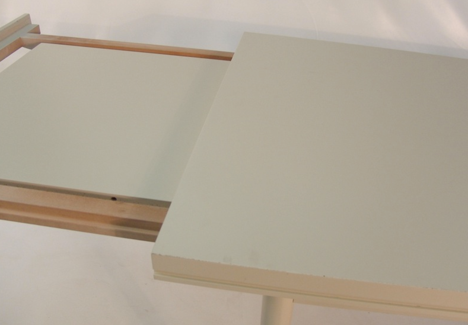 Beige extendable wooden table