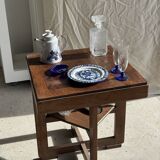 Artesania Alvarez Spanish plate in terracotta with blue plant motif.