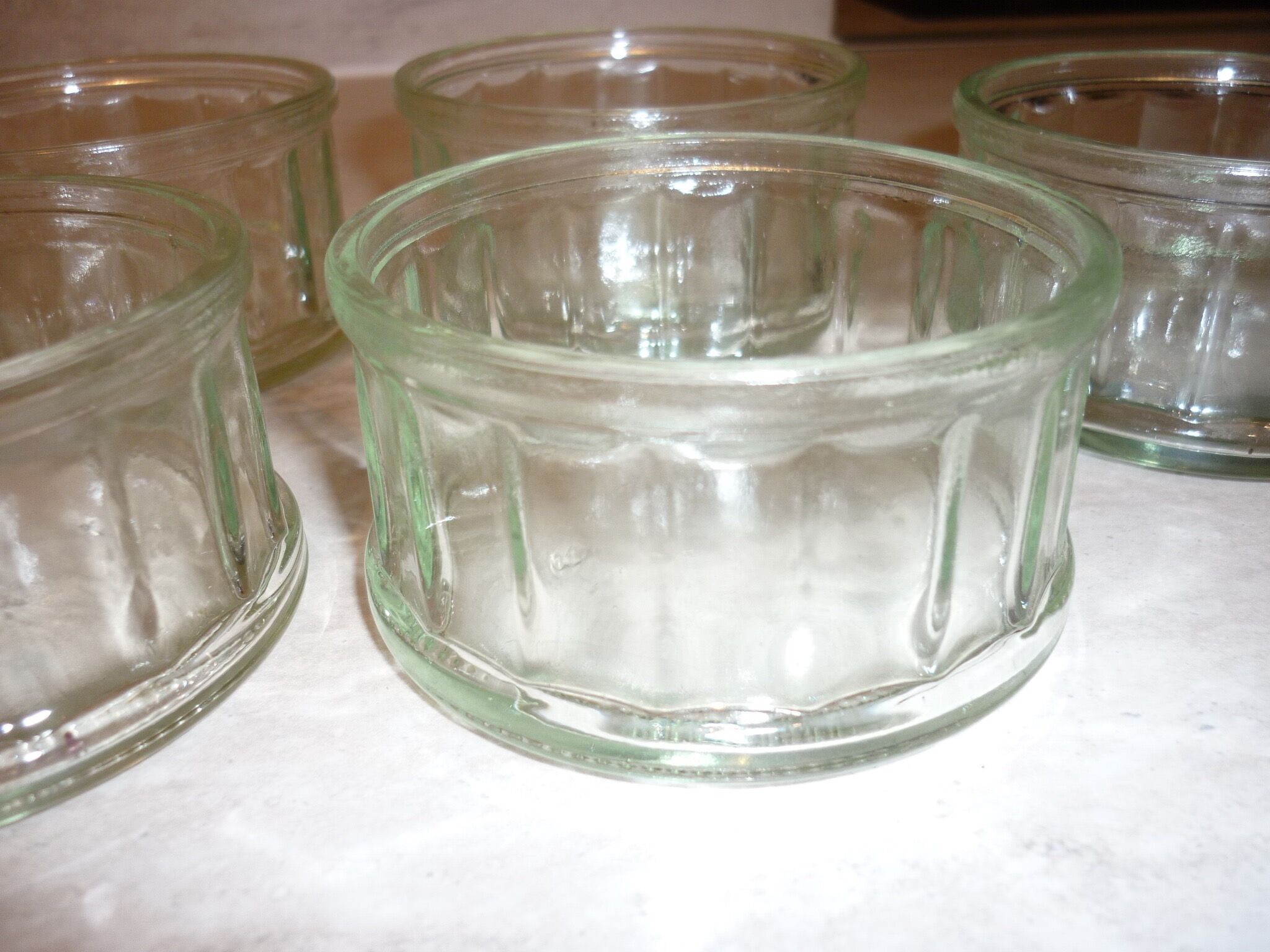 9 ramekins in vintage pressed and molded glass
