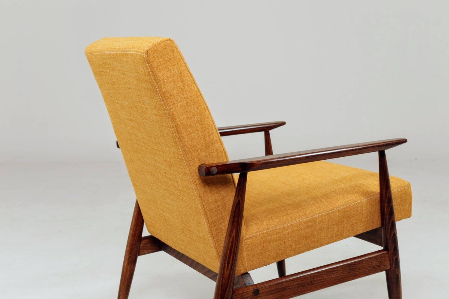 Vintage amber armchair Hermes designed by H. Lis